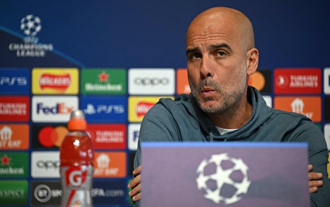 Pep Guardiola je ohranjal optimizem tudi med zadnjo novinarsko konferenco. FOTO: Paul Ellis/AFP