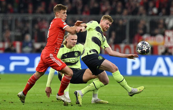 Kevin De Bruyne in Erling Haaland sta zmagovita naveza Manchester Cityja. FOTO: Christof Stache/AFP