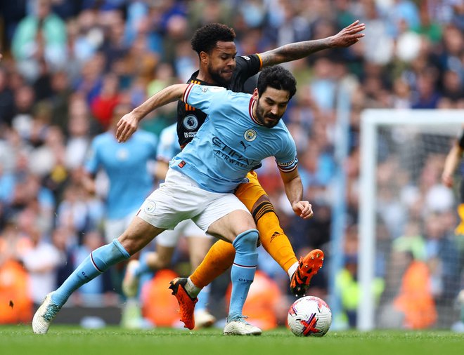 Ilkay Gundogan je dvakrat zatresel mrežo in zapravil najstrožjo kazen. FOTO: Molly Darlington/Reuters