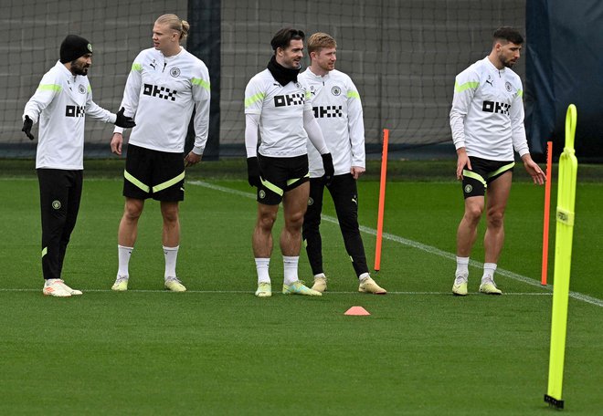 Ilkay Gündogan, Erling Haaland, Jack Grealish, Kevin De Bruyne in Ruben Dias so se takole pripravljali za spopad z madridskim Realom. Foto Paul Ellis/AFP