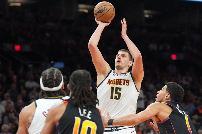 Nikola Jokić in Denver sta bila za košarkarje Phoenixa previsoka ovira. FOTO: Joe Camporeale/Usa Today Sports/Reuters