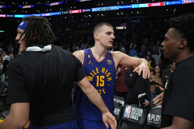 Nikola Jokić je vajeti Denverjeve igre prevzel v zadnji četrtini. FOTO: Kirby Lee/Usa Today/Reuters