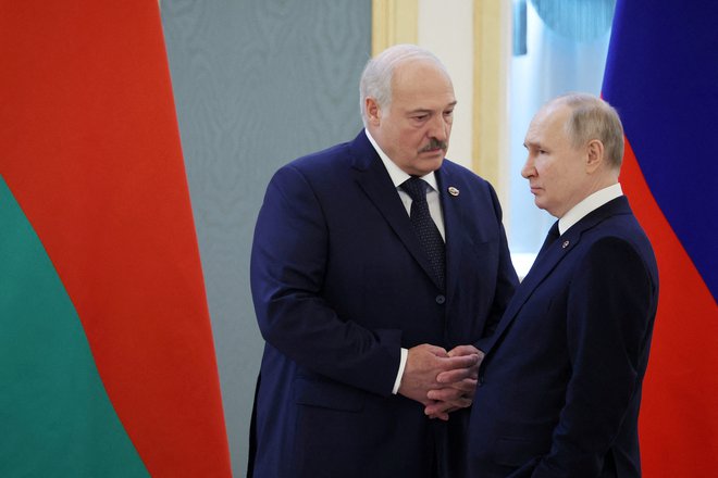 Beloruski predsednik Aleksander Lukašenko je že drugič v tem mesecu obiskal Moskvo, kjer ga je sprejel Vladimir Putin. FOTO: Mikhail Klimentyev/Sputnik Via Reuters