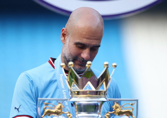 Pep Guardiola je osvojil nov naslov v Angili. FOTO: Carl Recine Reuters