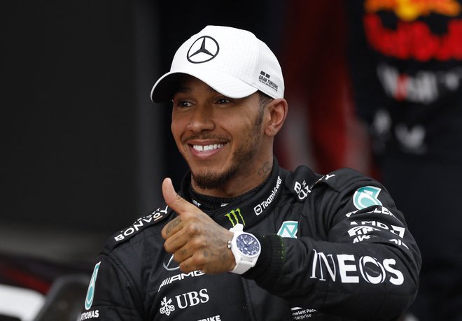 Lewis Hamilton je bil dobre volje v Barceloni. FOTO: Albert Gea/ Reuters