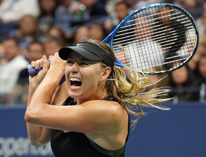 Marija Šarapova med teniškim dvobojem s Simono Halep avgusta 2017. FOTO: Don Emmert/AFP