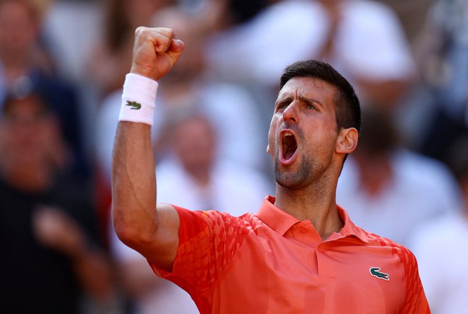 Novak Đoković se je veselil napredovanja v polfinale. FOTO: Lisi Niesner/Reuters