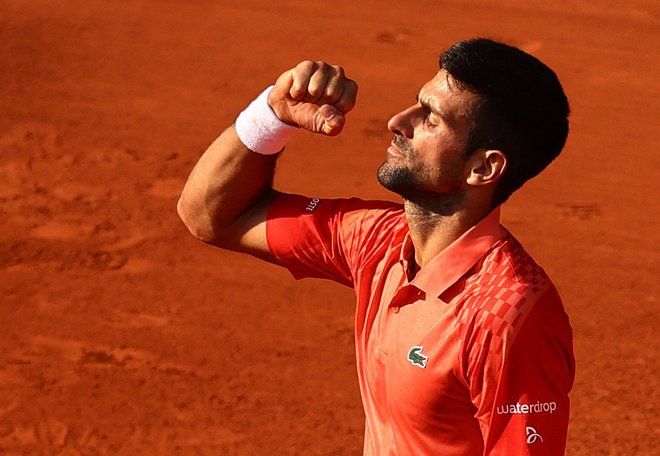 Novak Đoković je zdaj že zelo blizu rekordne 23. lovorike na turnirjih za grand slam. FOTO: Kai Pfaffenbach/Reuters