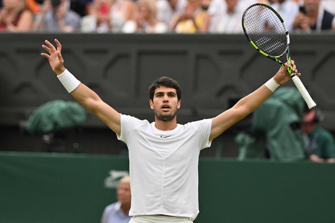 Carlos Alcaraz je prišel v Wimbledon kot številka 1 lestvice ATP. FOTO: Glyn Kirk/AFP