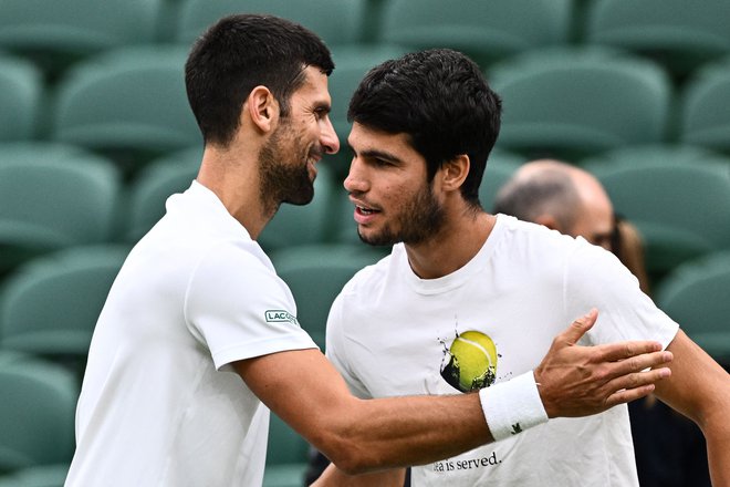 Novak Đoković in Carlos Alcaraz sta v Wimbledonu skupaj trenirala. FOTO: Sebastien Bozon/AFP