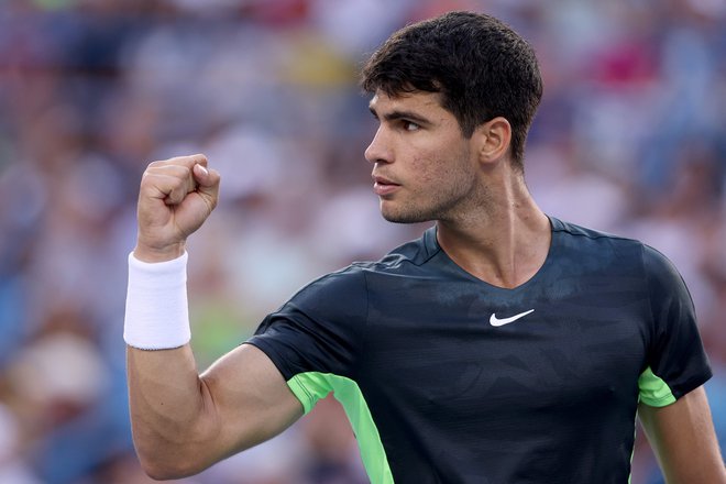 Prejšnji mesec se je Carlos Alcaraz veselil wimbledonske lovorike, zdaj napada to v Cincinattiju. FOTO: Matthew Stockman/AFP