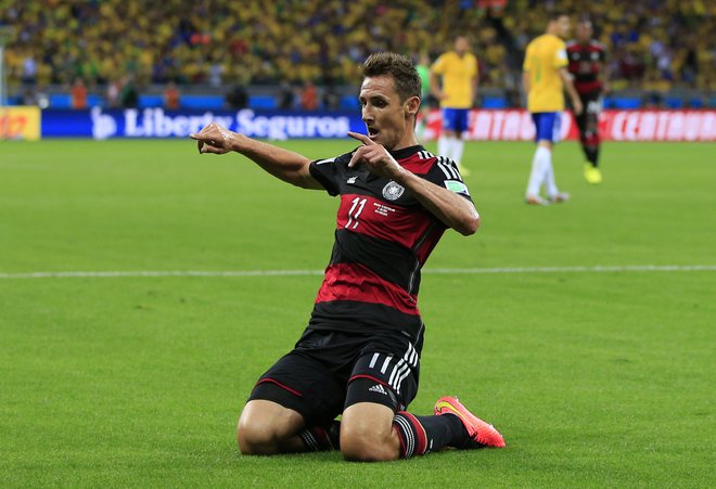 Miroslav Klose v majici Nemčiji med tekmo z Brazilijo na mundialu 2014. FOTO: Adrian Dennis/AFP