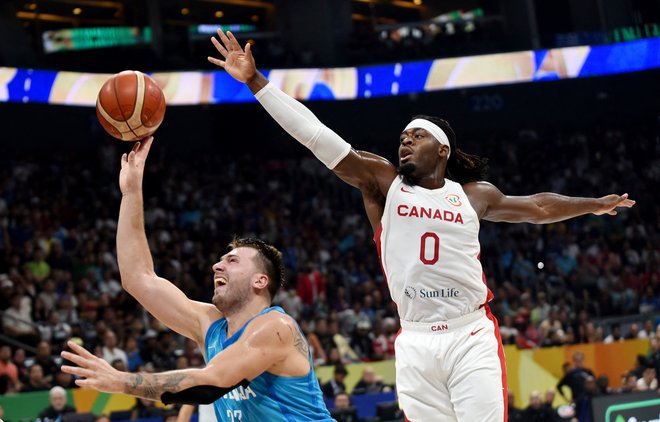 Luka Dončić je skupaj zbral 26 točk. FOTO: Lisa Marie David/Reuters