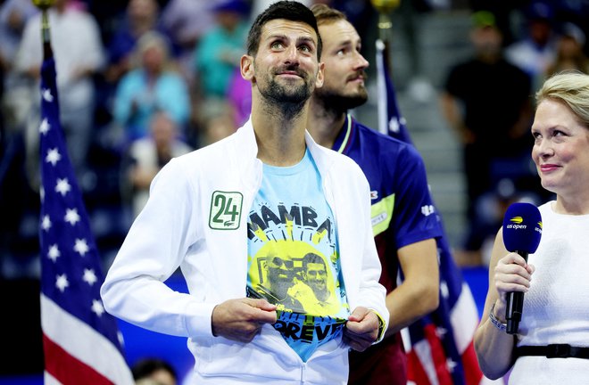 Novak z majico v spomin na Kobeja Bryanta. Foto Mike Segar/Reuters