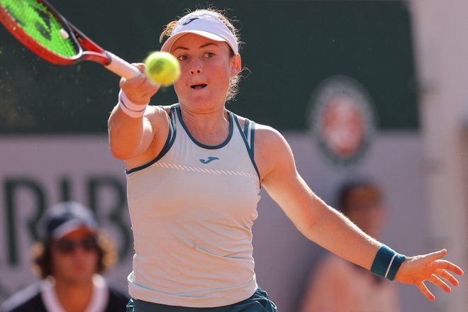 Tamara Zidanšek je uspešno preskočila slovensko oviro in bo igrala v četrtfinalu. FOTO: Thomas Samson/AFP