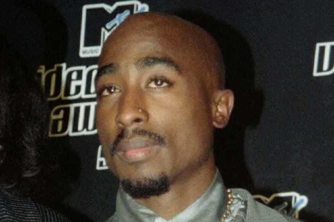 Reper Tupac Shakur na podelitvi MTV nagrad septembra 1996. FOTO: Reuters 