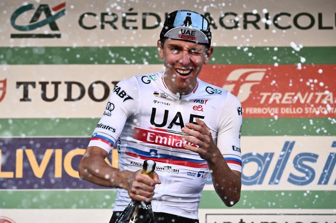 Šampanjec za zmagovalca. FOTO: Marco Bertorello/AFP