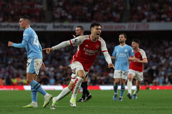 Gabriel Martinelli je bil mož odločitve na derbiju. FOTO: Adrian Dennis/AFP