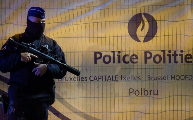 Pripadnik belgijske policije. FOTO: Johanna Geron/Reuters