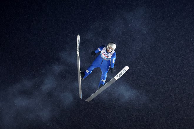 Vladimir Zografski se je z ženo Agnieszko, nekdanjo novinarko iz Krakova, s katero imata triletno hčerko Mio, zaradi boljših razmer za trening preselil v Zakopane. FOTO: Lisi Niesner/Reuters