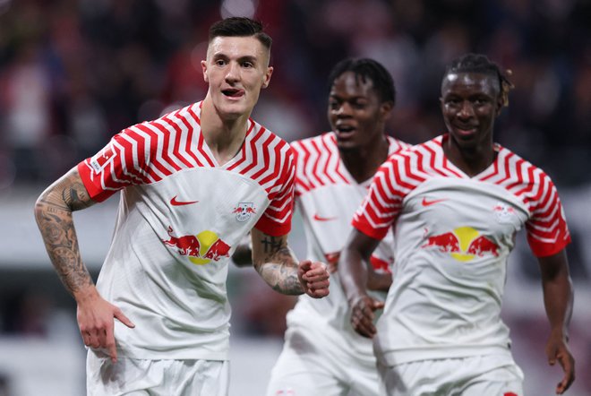 Benjamin Šeško je slavil svoj gol za Leipzig proti Kölnu. Foto Ronny Hartmann/AFP