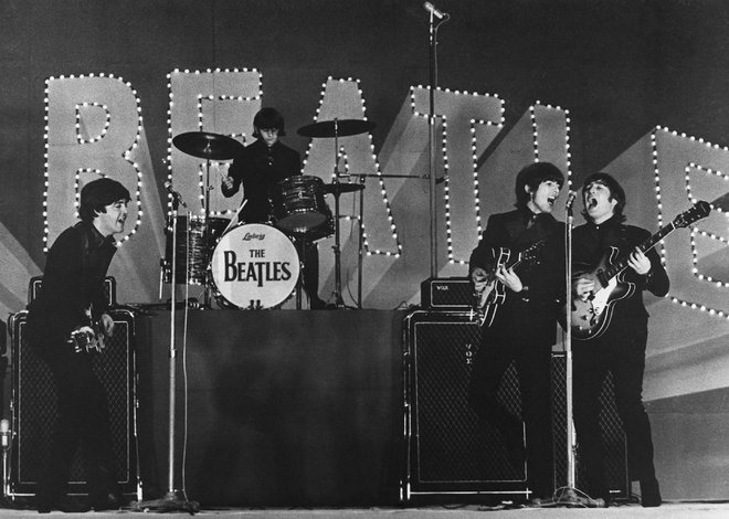 Paul McCartney, Ringo Starr, George Harrison in John Lennon med koncertom v Tokiu leta 1966 FOTO: AFP