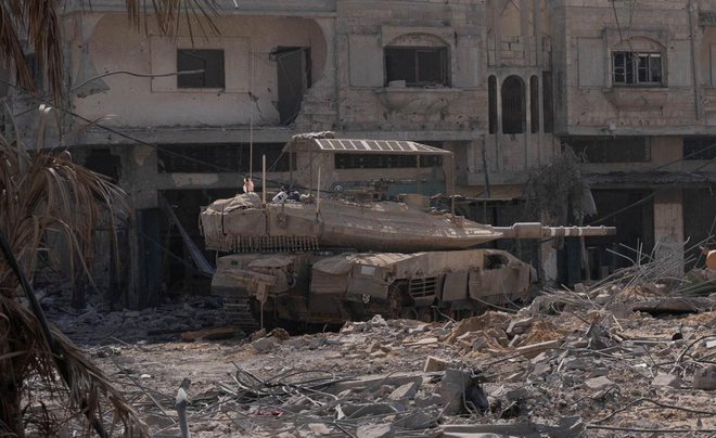 Izraelski tank v Gazi FOTO: Izraelske varnostne sile via Reuters