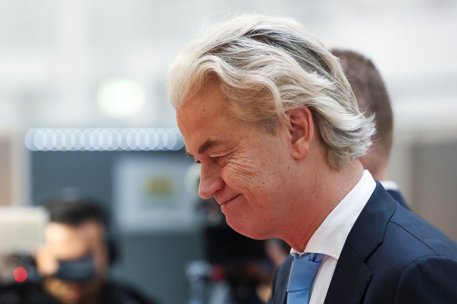 Vodja Stranke za svobodo (PVV) Geert Wilders med obiskom volišča. FOTO: REUTERS/Yves Herman