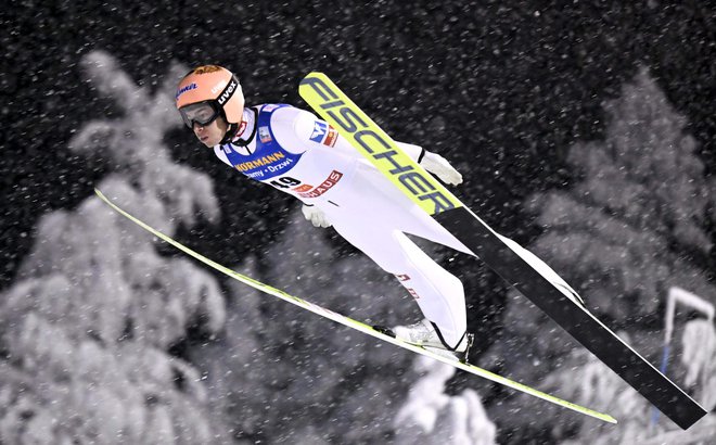 Stefan Kraft je dobil uvodno tekmo. FOTO: Jussi Nukari/AFP