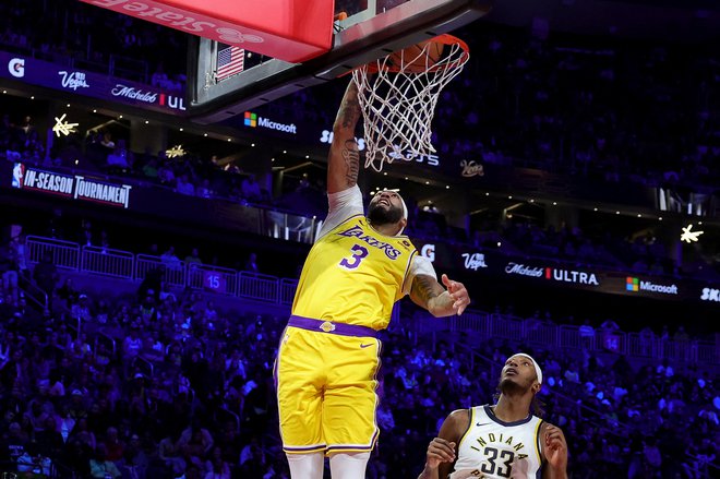 Anthony Davis je v finalu prispeval največ točk k zmagi moštva Los Angeles Lakers. FOTO: Ethan Miller/AFP