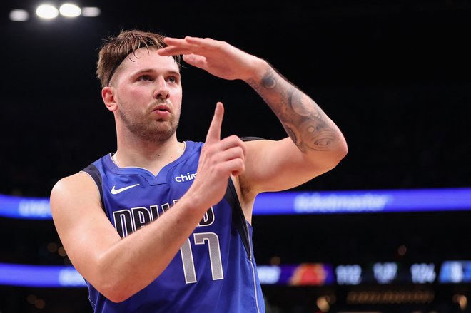 Luka Dončić postavlja nove mjnike v ligi NBA. FOTO: Christian Petersen/AFP