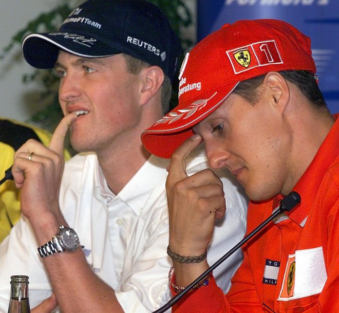 Ralf Schumacher (levo) in Michael sta bila tekmeca v formuli 1. FOTO:  Gero Breloer/EPA