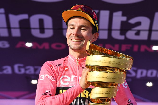 Primož Roglič je v minuli sezoni z Jumbo Vismo dobil Giro, z novo ekipo bo letos poskusil osvojiti rumeno majico na Touru. FOTO: Jennifer Lorenzini/Reuters