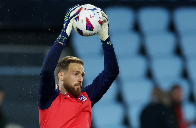 Jan Oblak sodi med najbolj uveljavljene vratarje na svetu. FOTO: Isabel Infantes/Reuters