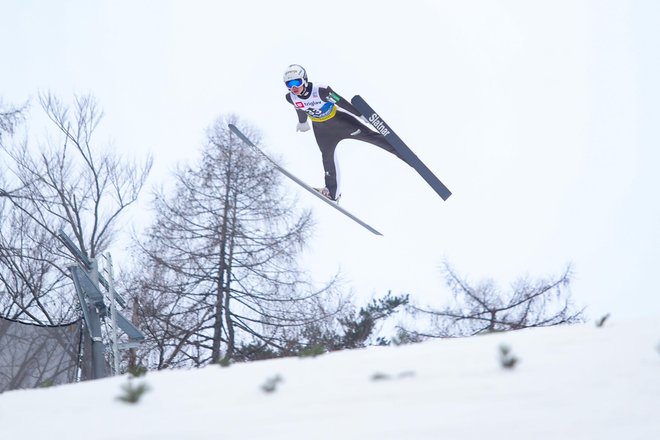 Rok Masle se s kolegi iz ekipe ni veselil odličja. FOTO: Voranc Vogel