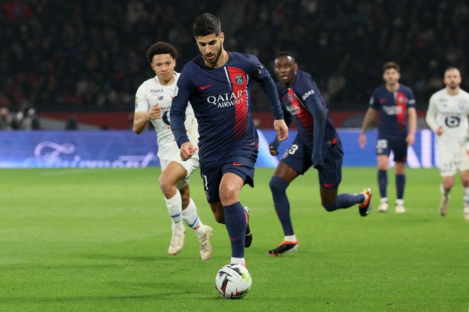 Marco Asensio je iz Madrida prinesel v Pariz šampionsko miselnost. FOTO: Alain Jocard/AFP