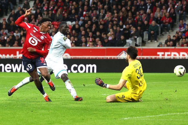 Jonathan David (levo) je za Lille dosegel hat-trick. FOTO: Denis Charlet/AFP