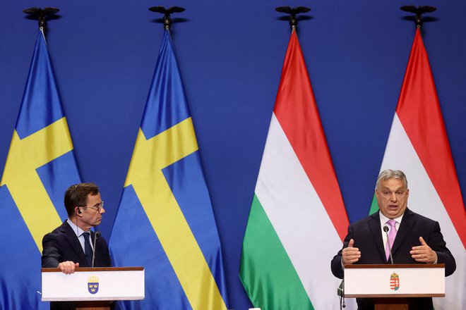 Švedski premier Ulf Kristersson in madžarski voditelj Viktor Orbán sta se nekaj dni pred glasovanjem sestala v Budimpešti FOTO: REUTERS/Bernadett Szabo