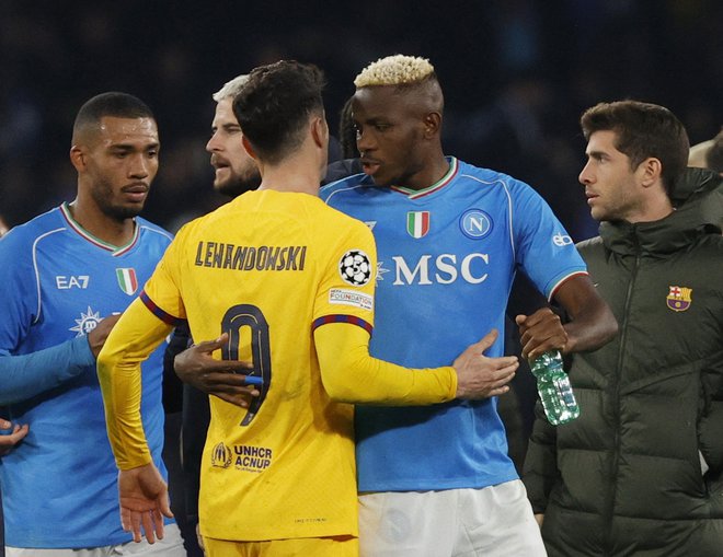 Robert Lewandowski in Victor Osimhen sta bila strelca na prvi tekmi. Foto Ciro De Luca/Reuters