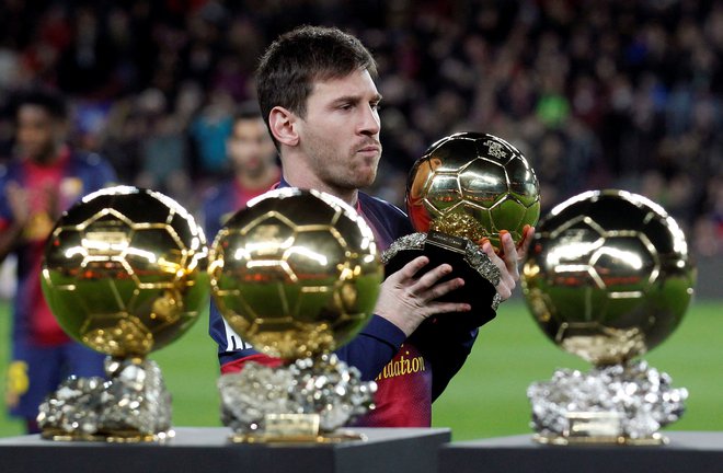 Leo Messi in njegove zlate žoge. FOTO: Albert Gea/Reuters