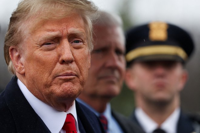 FILE PHOTO: Former U.S. President Donald Trump speaks after attending a wake for New York City Police Department (NYPD) officer Jonathan Diller, who was shot and killed while making a routine traffic stop on March 25 in the Far Rockaway section of Queens, in Massapequa Park, New York, U.S., March 28, 2024. REUTERS/Shannon Stapleton/File Photo