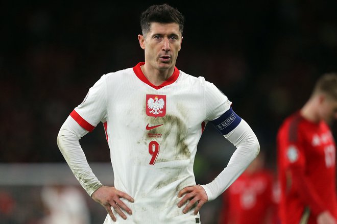 Robert Lewandowski je v klubski karieri dosegel praktično vse, na reprezentančni uspeh pa še čaka. FOTO: Geoff Caddick/AFP