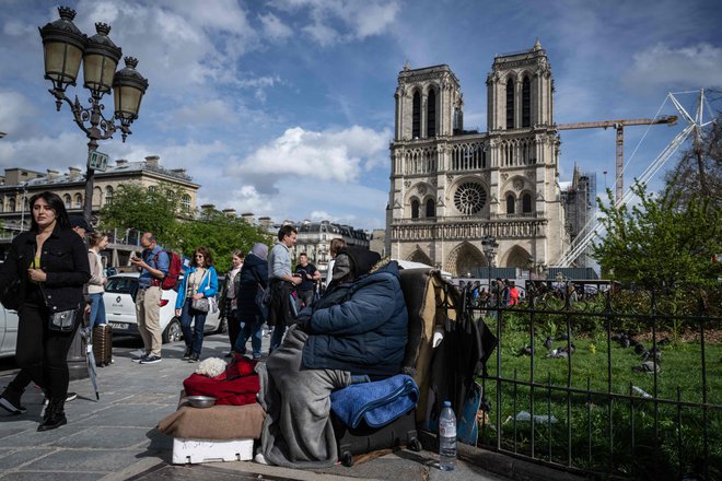 Petnajstega aprila bo minilo pet let od požara, ki je uničil pariško stolnico Notre Dame, a do odprtja olimpijskih iger bo obnova končana. FOTO:  Miguel Medina/AFP