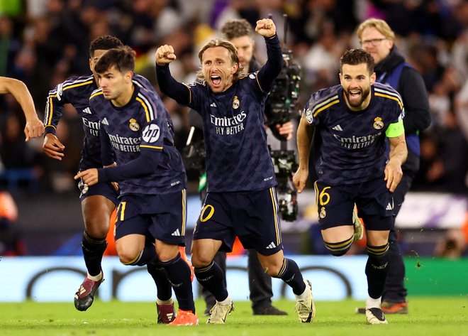 Tako so se Luka Modrić in soigralci veselili Realove uvrstitve v polfinale. FOTO: Carl Recine/Reuters