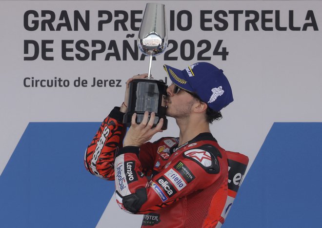 Francesco Bagnaia se je takole veselil v Jerezu. FOTO: Jon Nazca /Reuters