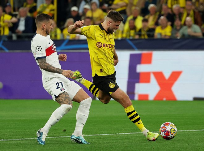 Takole je Niclas Füllkrug odločil prvo polfinalno tekmo s PSG-jem. Foto Thilo Schmuelgen/Reuters