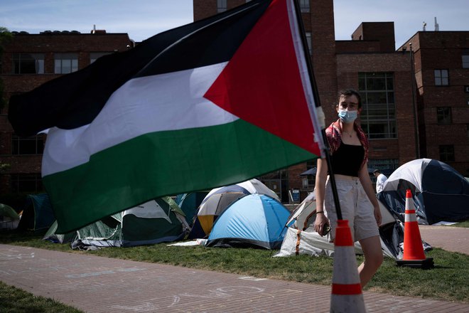 Pro-Palestinian students and activists gather at a protest encampment at George Washington University in Washington, DC, on May 3, 2024. Dozens of universities in the United States have seen pro-Palestinian demonstrations in recent weeks, leading to clashes with police and counter-protests. (Photo by Brendan Smialowski / AFP)