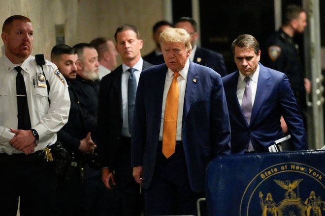 Donald Trump ob prihodu na sodišče v New Yorku. FOTO: Mary Altaffer/Reuters