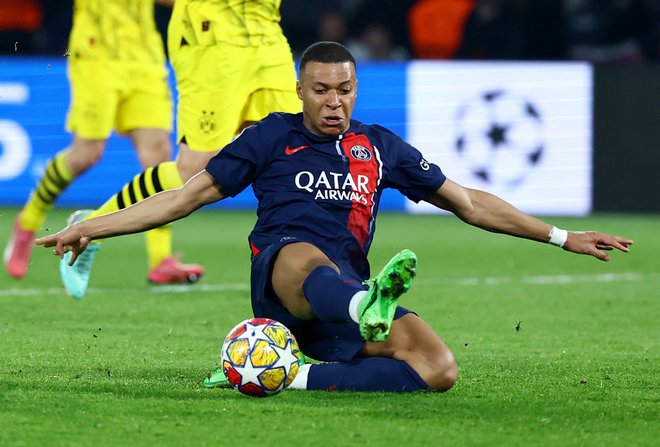 Kylian Mbappe sodi med najhitrejše nogometaše na svetu. FOTO: Kai Pfaffenbach/Reuters