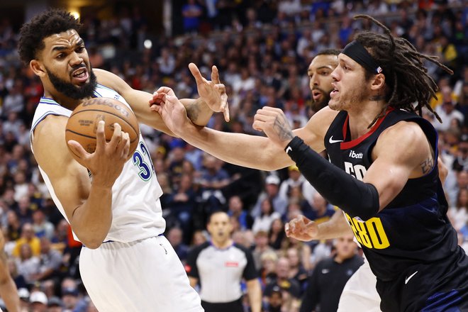 Karl-Anthony Towns (levo) je bil tokrat najzaslužnejši za zmago Minnesote. FOTO: C. Morgan Engel/AFP